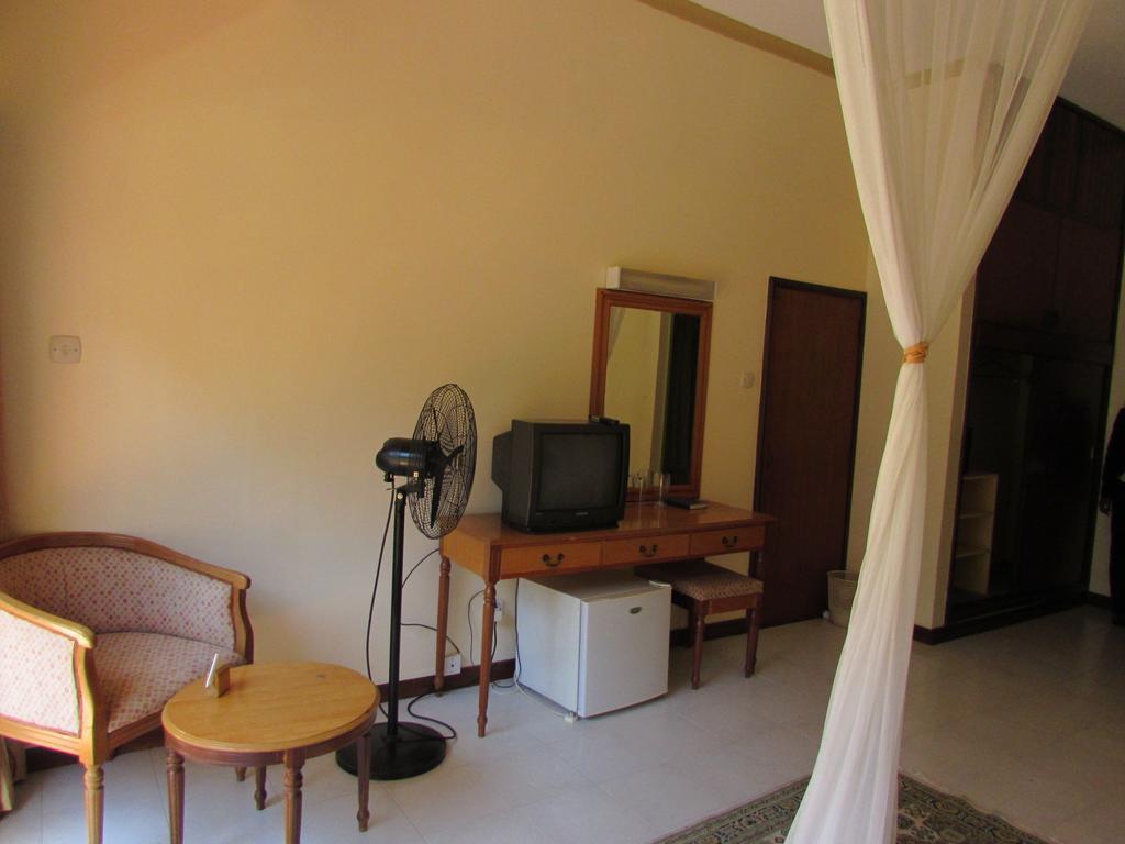 Equator Hotel Arusha Szoba fotó